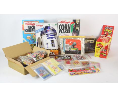 Assorted candy and candy wrappers / containers relating to TV and Film. Terrahawks bubble gum, Doctor Who Nestle wrappers, Mo