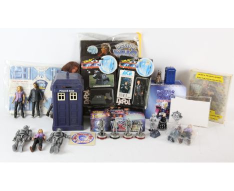 Doctor Who. 7 modern era figures, a 70s Leela doll by Mego Corp, 2 DAPOL carded figures, a Daleks wooden puzzle circa 1965, a