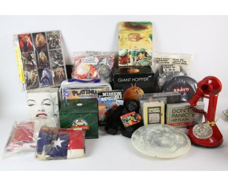 Assorted TV & Film etc toys / memorabilia. Lunar light, Barbed Wire cards, Giant Space Hopper, Marilyn Monroe perfume, Red Te