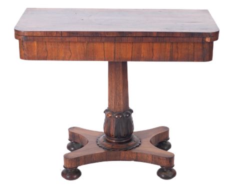 An early Victorian rosewood rectangular card table, the baize lined hinged top with rounded corners, on polygonal column with
