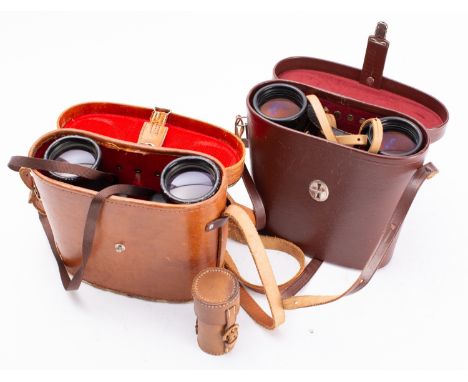 Two pairs of binoculars and a lens. Comprising a pair of Karl Zeiss Dekarem 10 x 50 and a pair of Taiyo 12 x 50 field binocul
