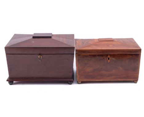 Two George IV mahogany sarcophagus form tea caddies, circa 1825; the larger example with bone keyhole surround and bereft int