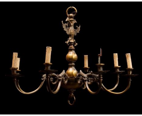 A Continental brass eight light chandelier, in late 17th /early 18th century taste, early 20th century; the electrical fitmen