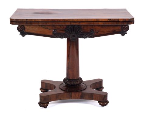 A Victorian rosewood rectangular card table, the baize lined hinged top with rounded corners, the frieze with applied anthemi