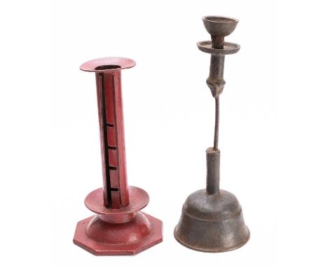 A red toleware adjustable candlestick, first half 19th century; the cylindrical socket slotted for a rise-and-fall candle hol