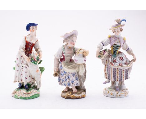 Two Meissen figures and a Derby figure the first modelled as a girl holding a pitcher, incised F22, late 19th century, 12cm; 