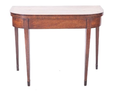 An early 19th Century mahogany and inlaid card table, of D shaped outline, bordered with boxwood lines, the crossbanded hinge