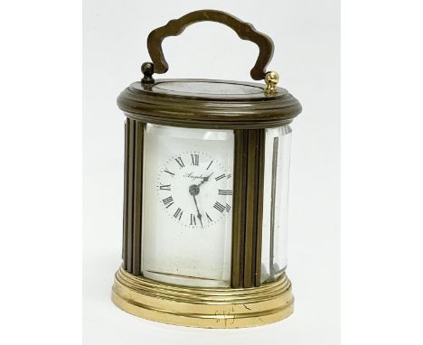 A small vintage French brass carriage clock. Angelus. 7x8cm 