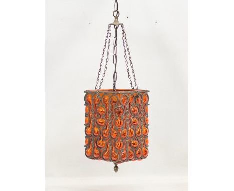 A large vintage Amber Bubble Glass brass bound light fitting. Shade measures 20x20x34cm. 94cm including chain. 