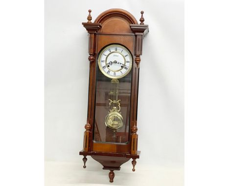 A large Victorian style mahogany Vienna wall clock. Highlands. 94cm 