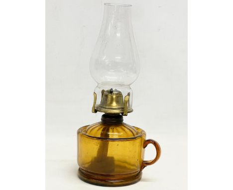 A late Victorian Amber Glass finger oil lamp. 14x28cm 