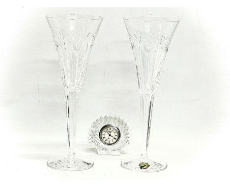 A pair of large Waterford ‘Love’ champagne glasses and a small Waterford clock. 23.5cm 