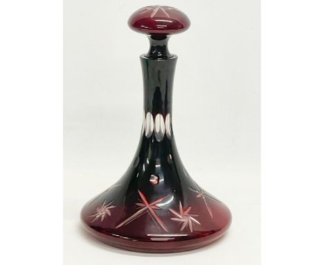 A large vintage Ruby Glass ships decanter. 19x28cm 