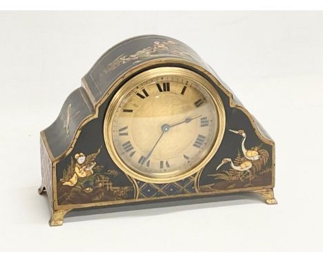 An early 20th century Chinoiserie decorated mantle clock with French movement. 19x7.5x13.5cm 