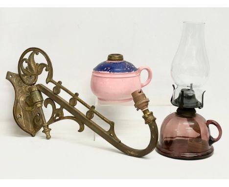 2 late 19th century glass and pottery finger oil lamps and a large brass wall light. 
