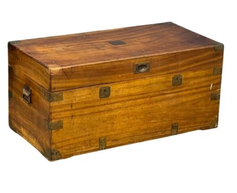 A Victorian camphorwood campaign military trunk. 97x49x46cm 
