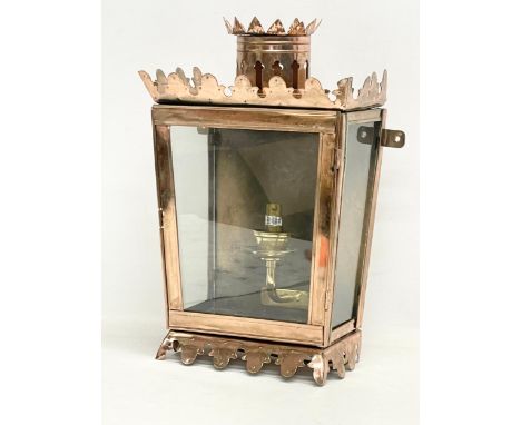 A 19th century style copper wall mounted lantern. 24x13x37.5cm 