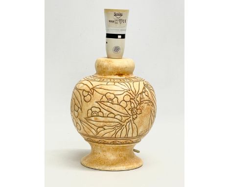 A 1920’s Charlotte Rhead pottery table lamp. Designed for Bursley Ware. 14x27cm 