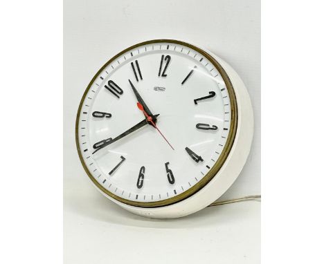 A vintage Metamec school clock. 23cm 