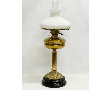 A large Victorian style brass double burner oil lamp. 69cm 