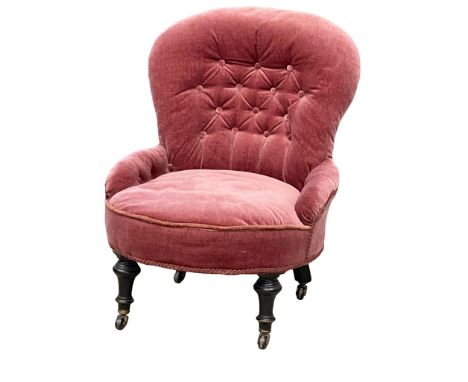 A Victorian button back ladies parlour chair. 