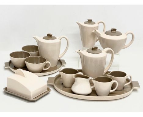 A collection of 1960’s Mid Century Poole Pottery tea and coffee ware. 