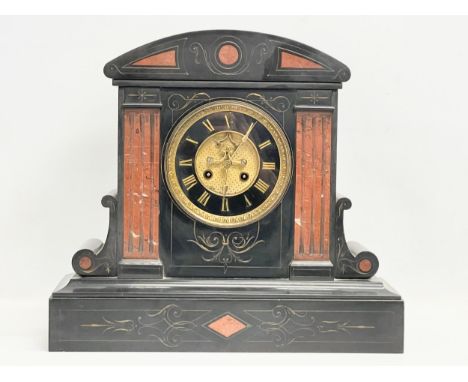 A large Victorian slate mantle clock. 41x15x37cm 