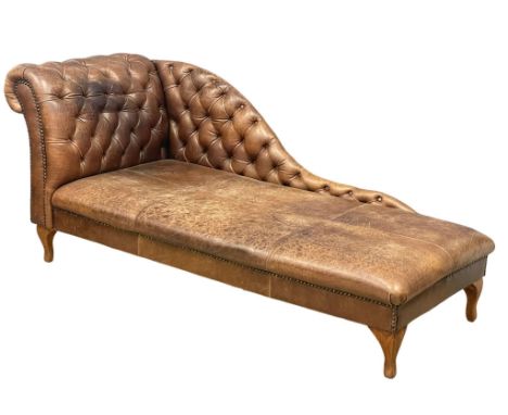A very large deep button leather chaise lounge. 221x89x95cm 