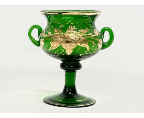 A late 19th century hand blown Bristol Green vase in the manner of Moser. 14x11x13.5cm 