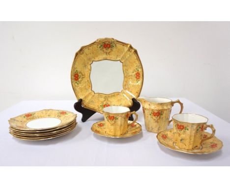 COLOURFUL 'COLLINGWOOD' BONE CHINA COFFEE SERVICEwith gilt and enamel floral detail on a mottled ground, comprising nine cups