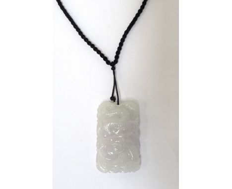 CARVED LIGHT PURPLE JADE PENDANTcarved with a dragon to one side and stylised bird to the other, approximately 4.9cm high
