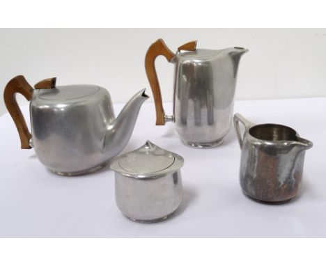 PICQUOT WARE TEA SERVICEcomprising a teapot; water jug, sugar basin with hinged cover; and a milk jug (4)