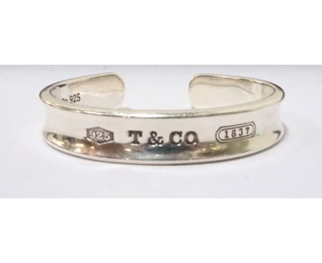 TIFFANY AND CO. 1837 SILVER CUFF BANGLEthe heavy shaped bangle inscribed with the year Tiffany was founded