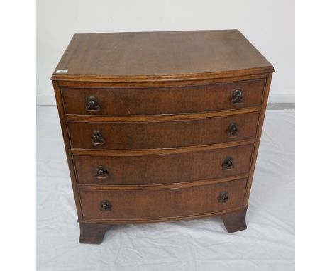 MAHOGANY BOW FRONT CHESTwith a moulded top above four graduated and cockbeaded drawers, standing on bracket feet, 75.5cm wide