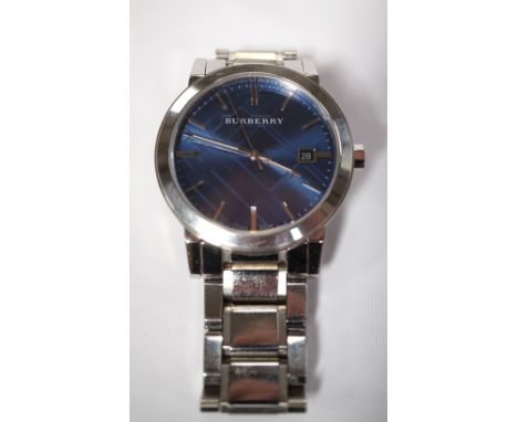 GENTLEMEN'S BURBERRY 'THE CITY' WRISTWATCHthe blue check stamped dial with baton markers and date aperture, model number BU90