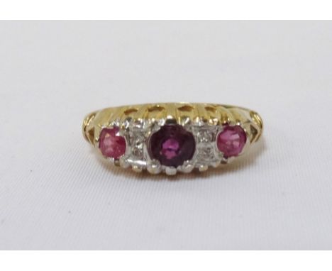 RUBY AND DIAMOND RINGon nine carat gold shank, ring size I-J