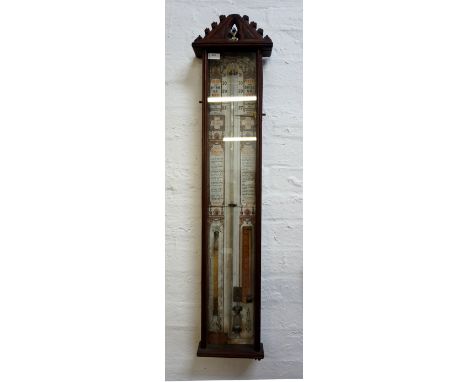 'ADMIRAL FITZROY'S BAROMETER'circa 1900, in an oak case with a printed paper backboard and exposed syphon tube, with small in