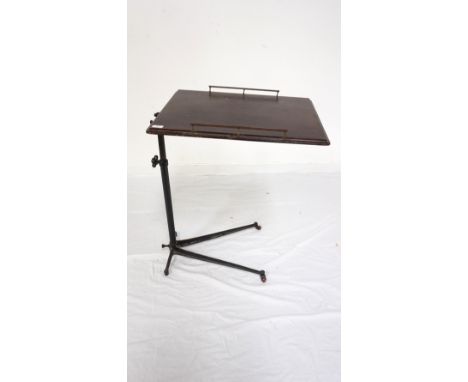 VINTAGE ADJUSTABLE TABLEwith an oblong oak top with fold away metal gallery sides, on an adjustable metal wheeled base and st
