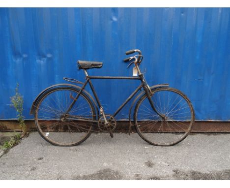 VINTAGE GENTLEMAN'S BICYCLEwith a sprung saddle and mud guards