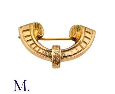 A Gold Brooch in rose gold of scrolling crescent shaped design, the reverse engraved M . LAWTHER, (untested but tests indicat