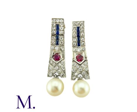 A Pair Of Pearl, Diamond, Ruby and Sapphire Earrings in platinum, the articulated geometric tops set with French cut sapphire