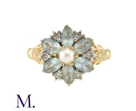 A Pearl, White Sapphire And Aquamarine Dress Ring, in 14k yellow gold, the central pearl surrounded by marquise cut aquamarin