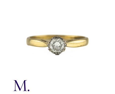 A Diamond Solitaire Ring in 18k yellow gold, set with a round cut diamond of 0.25cts. Hallmarked for 18ct gold, stamped Dia .