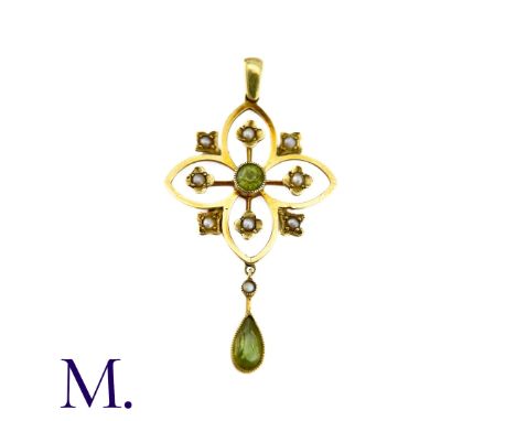 An Antique Peridot And Pearl Pendant in 15k yellow gold, the central round cut peridot accented by pearl set floral motifs wi