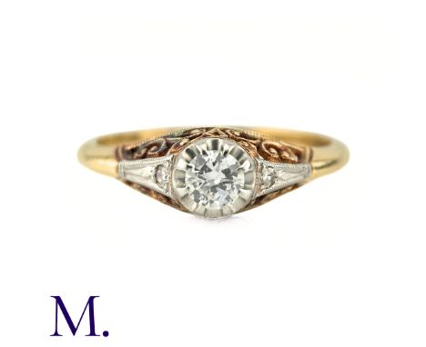 A Diamond Solitaire Ring in 18k yellow gold and platinum, the principal round brilliant cut diamond of approximately 0.20cts,