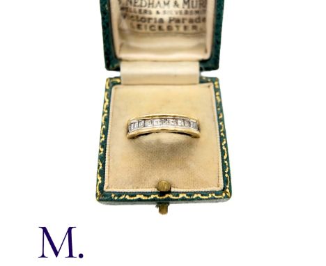 An Asscher Diamond Band Ring in 18K yellow gold, set with 28 asscher-cut diamonds weighing approximately 1.0ct in total.Weigh