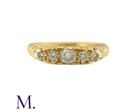 An Antique Diamond Five Stone Ring in yellow gold, set with old cut diamonds. (Unmarked but test indicate 18ct gold. Size: N 