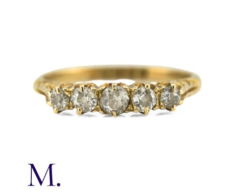 An Old Cut Diamond Five Stone Ring in 18k yellow gold, the five old cut diamonds totalling approximately 0.45cts. Full Britis