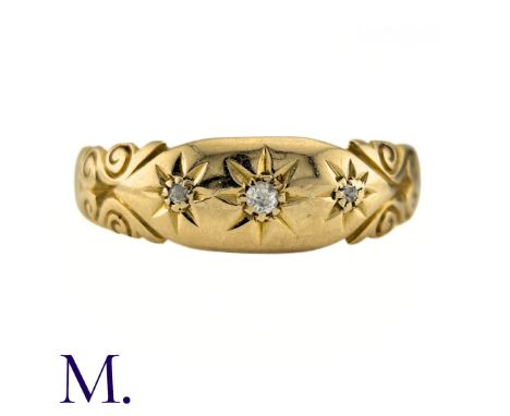 A Diamond Three Stone Gypsy Ring in 18k yellow gold, set with three old cut diamonds. Partially Hallmarked for 18ct gold. Siz