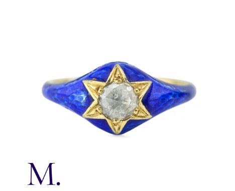 A Rose Cut Diamond And Enamel Gypsy Ring in yellow gold, the blue enamelled band set with a rose cut diamond within a star sh